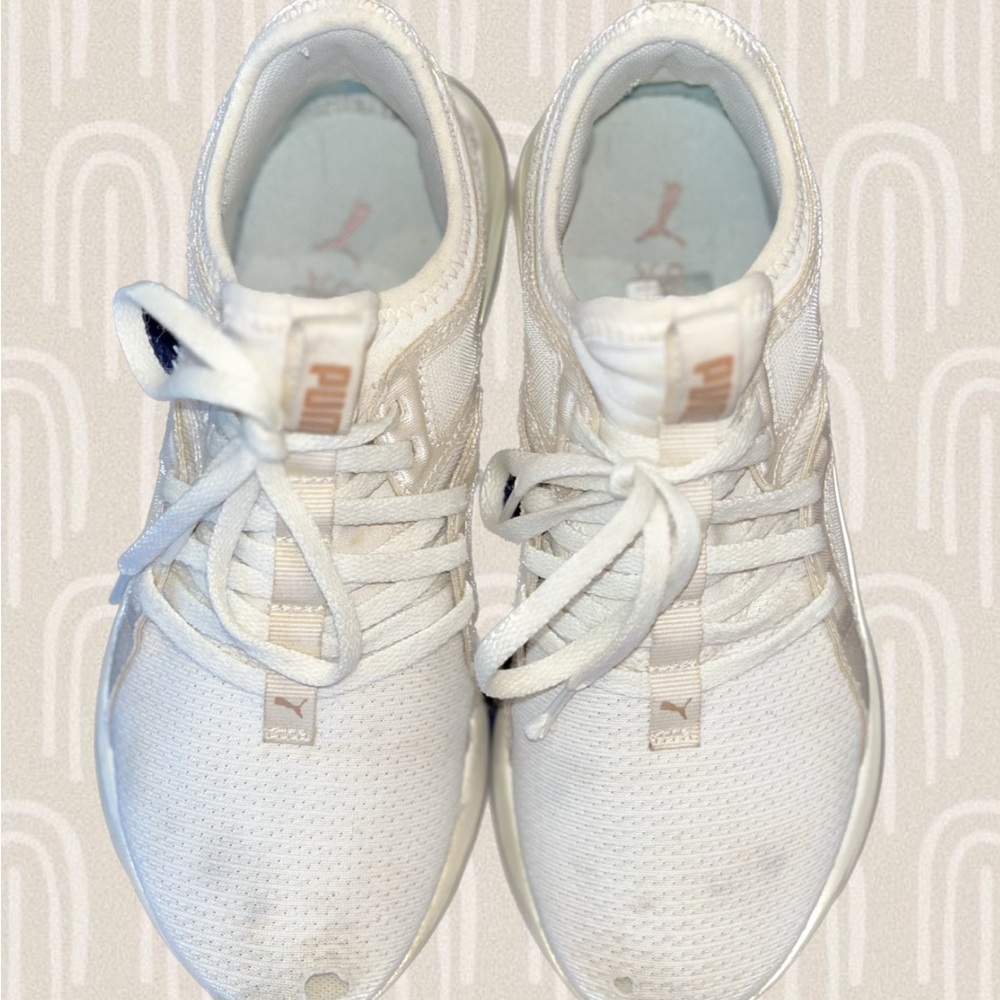 Puma white athletic shoes